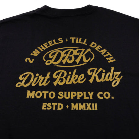 Gold Nugget Tee: close-up of black back graphic with gold “Dirt Bike Kidz”